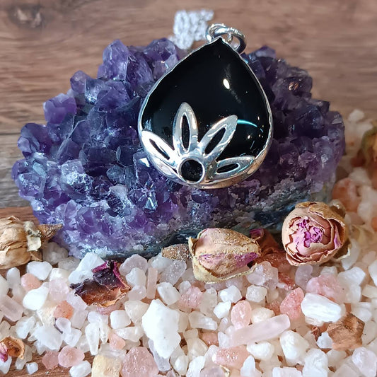 Handmade Silver Lotus Pendant on Black Onyx – Teardrop 
